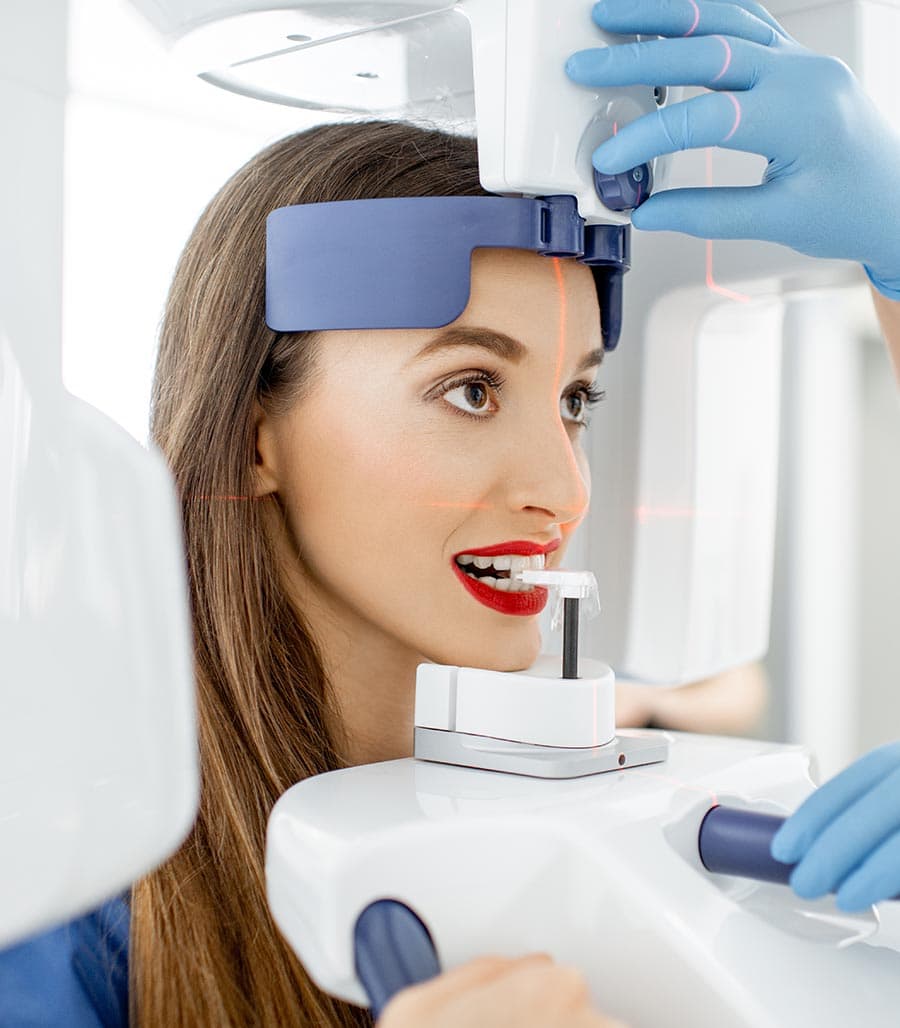 Patient using advanced dental imaging technology